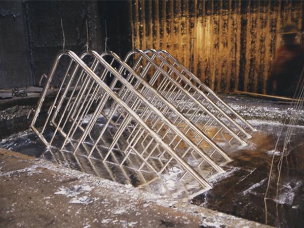 Several crowd control barriers in the galvanic bath.